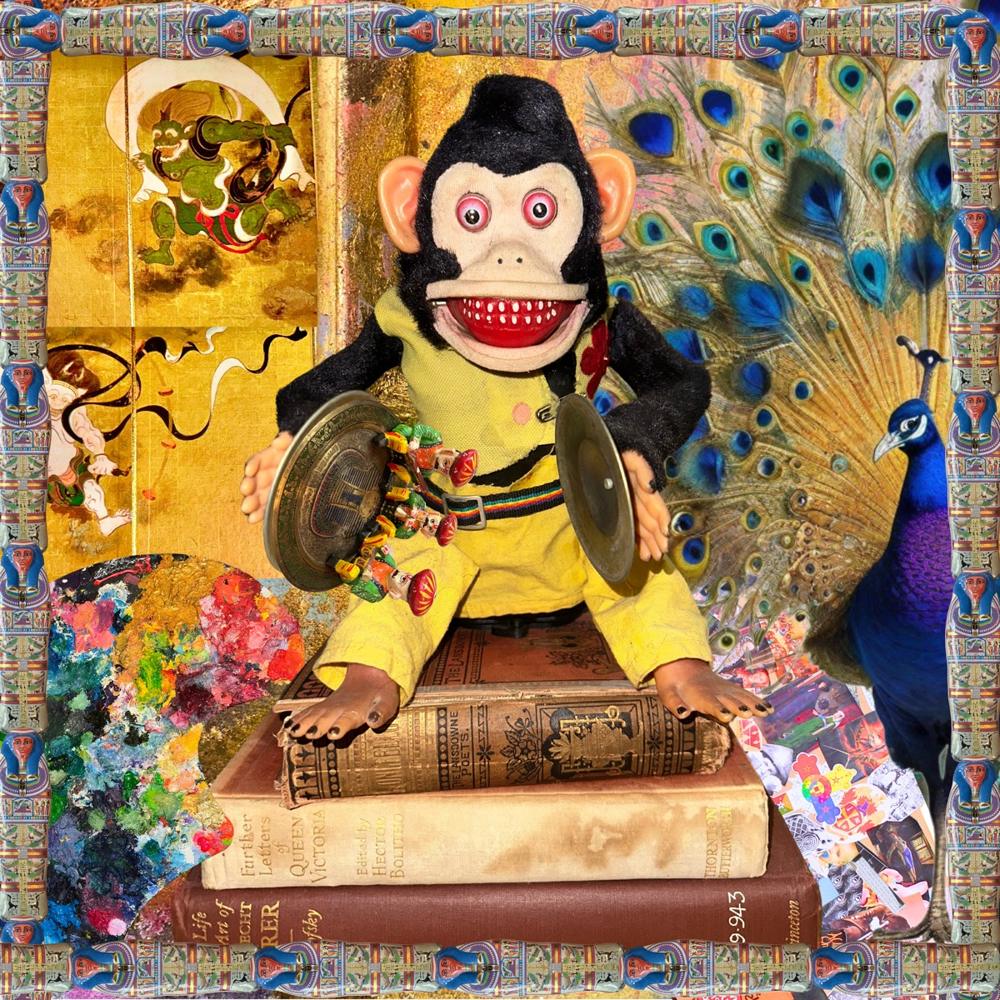 Looney Tunes artwork: a grinning cymbal-playing toy monkey on a pile of old books, surrounded by peacocks and gold leaf